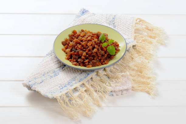 istock plate of sweet raisins 946244448
