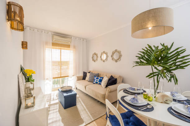 istock Living room with a dining table in modern, luxury, bright apartment 946247462