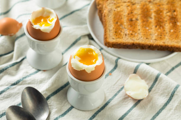 istock Homemade Soft Boiled Egg in a Cup 946256292