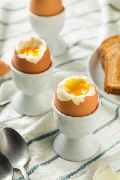 istock Homemade Soft Boiled Egg in a Cup 946256320