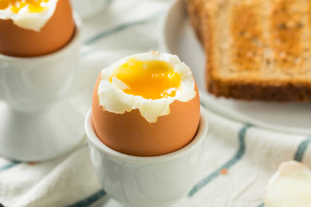 istock Homemade Soft Boiled Egg in a Cup 946256432