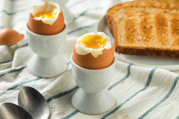 istock Homemade Soft Boiled Egg in a Cup 946256488