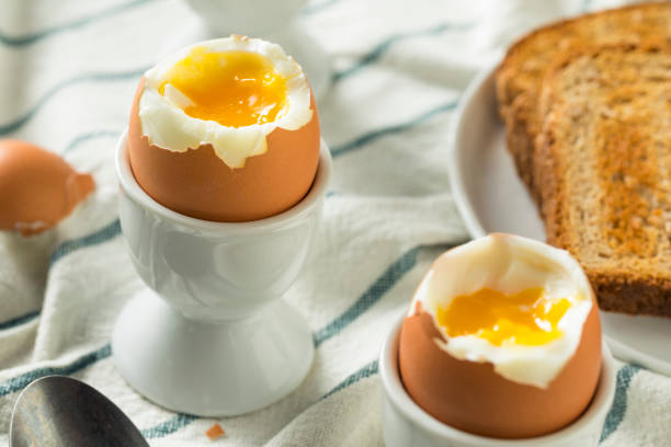 istock Homemade Soft Boiled Egg in a Cup 946256584