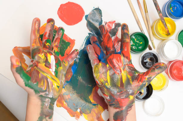 istock Painted with palms children's palms amuse. 946257024
