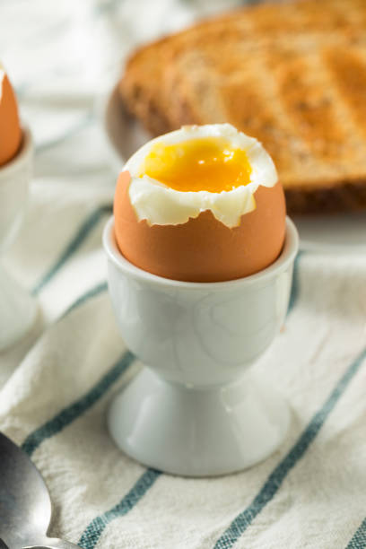 istock Homemade Soft Boiled Egg in a Cup 946257872