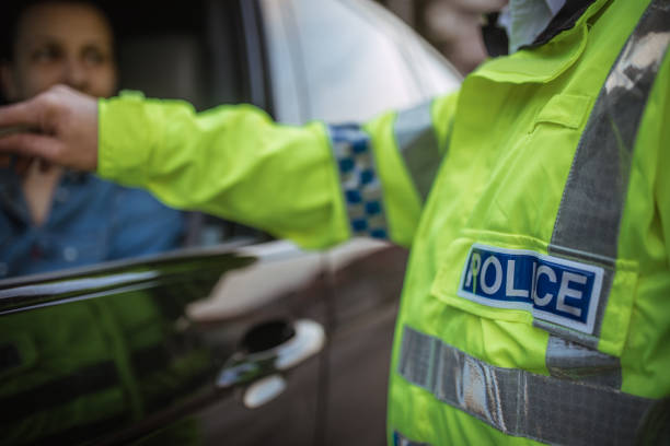 istock Young woman pulled over by police 946280458