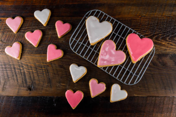 istock Heart Shaped Cookies On Cooling Rack and Table 946283314