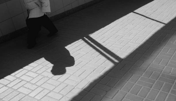 istock Silhouette person in an underground passage 946284034