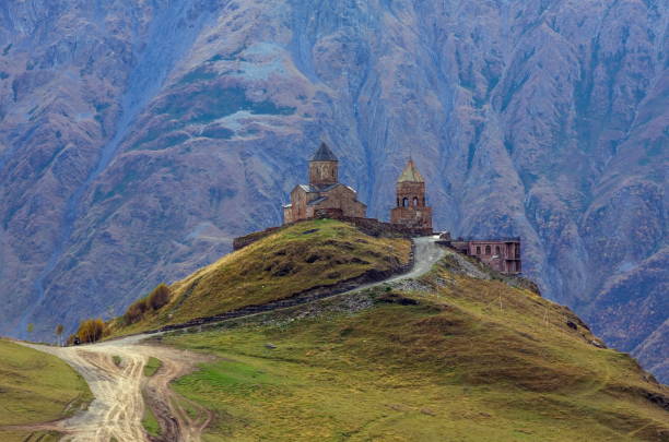 istock Cathedral On Hill Against Mountain 946286694