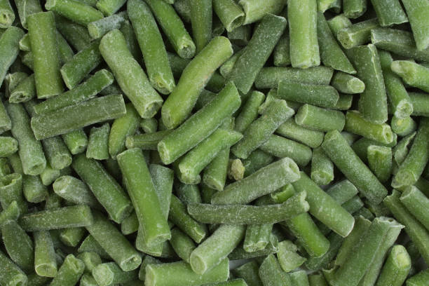 istock frozen chopped asparagus beans. top view. background green wax beans 946286720