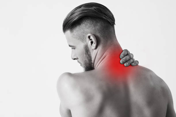 istock Hipster man touching his neck with hand 946288212
