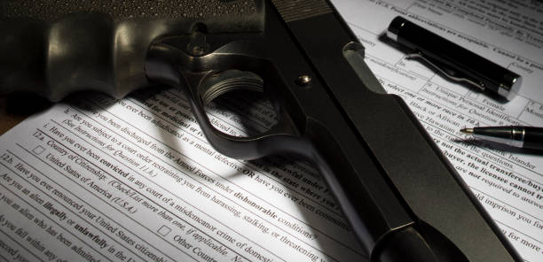 istock Handgun check and NICS background check 946290660