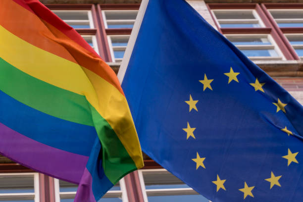 istock Low Angle View Of Flags Against Building 946291988
