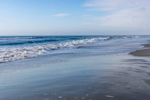 Crashing waves of the Atlantic Ocean on the beautiful beach of Hilton Head Island in South Carolina.