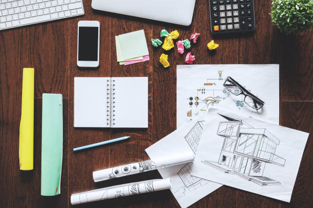 istock Modern wooden desk top with items 946312872