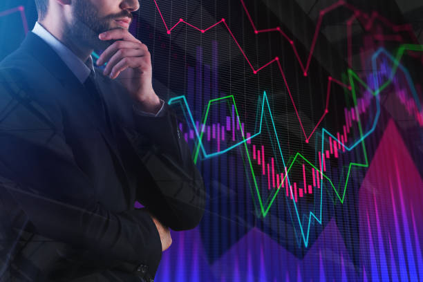 istock Thoughtful businessman with abstract forex chart 946313282