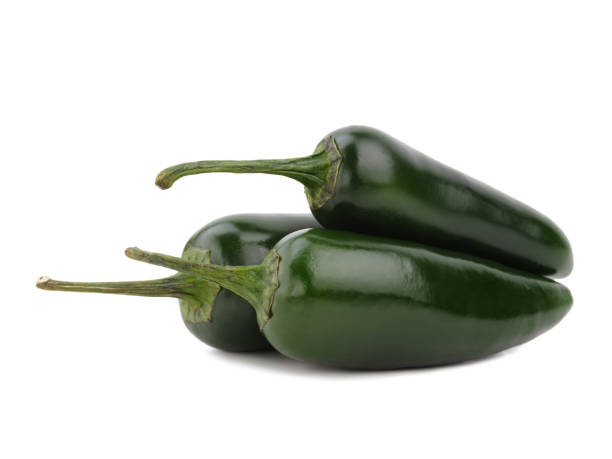 istock Three fresh green peppers isolated on a white background. Healthy vegetables concept. 946313444