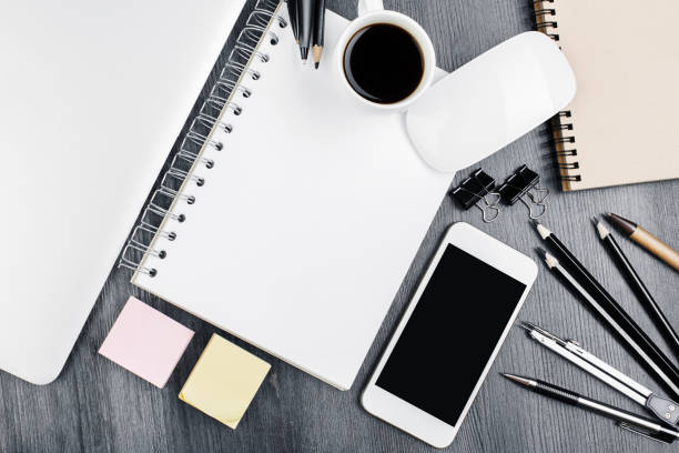 istock Stylish wooden desk top with items 946316344