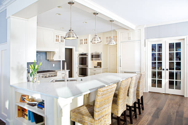 istock Modern Kitchen design with open concept and bar counter 946319712