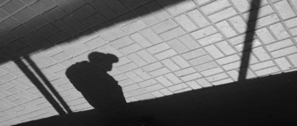 istock Silhouette person in an underground passage 946320858