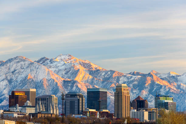 Salt lake City Downtown Salt lake City downtown and snow capped mountain salt lake city utah stock pictures, royalty-free photos & images