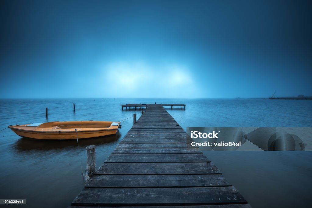 Small Dock and Boat at the lake Pier Stock Photo