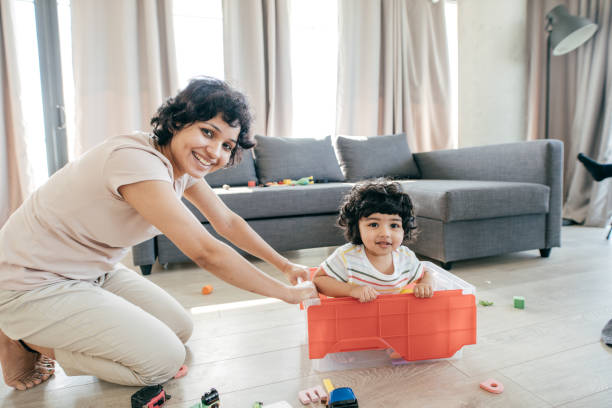 istock Mother and daughter looking happy 946328860