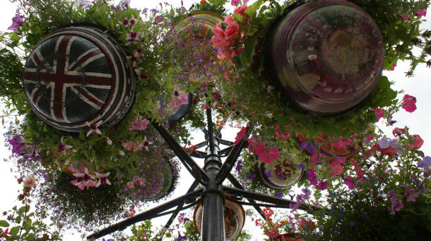 istock Flowers in hanging pots 946334632