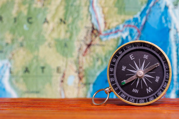 istock Compass on the map and travel ideas. 946342050