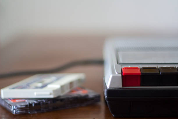 istock Vintage cassette tape player with audio cassette tapes on the side 946344932