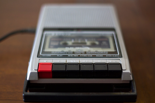 Vintage cassette tape player recorder with audio tape cassette inside