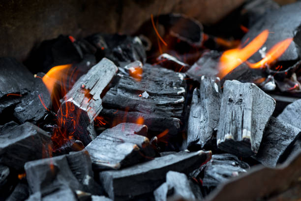 istock close-up burning natural coals in the fire 946355382