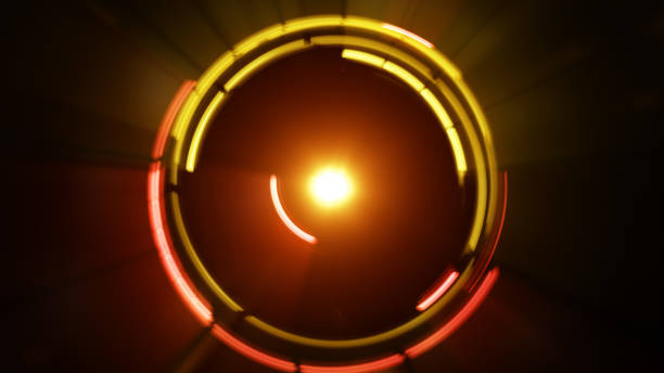 istock Yellow glowing light circles rotating futuristic background 946355574