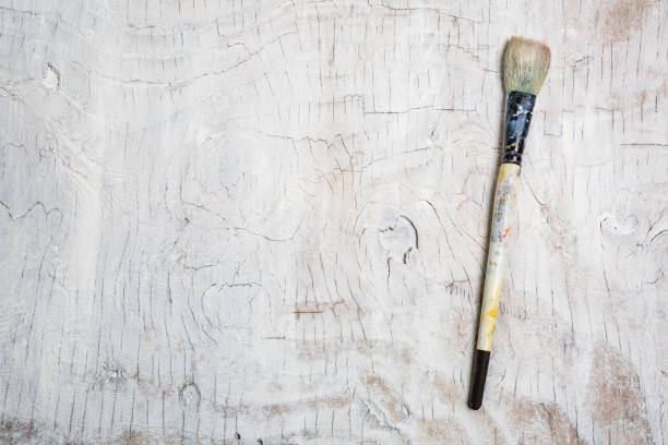 Close up Painter Brushes and Oil Paint in Art Studio