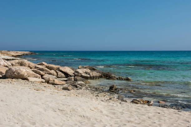 istock Rocky and sandy sea coast in Cyprus 946373796