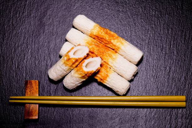bamboo. shaped fish paste cake bamboo. shaped fish paste cake chikuwa stock pictures, royalty-free photos & images