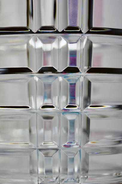 istock Macro abstract view of an illuminated lead crystal glass surface 946389336