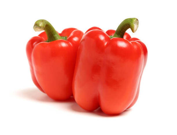 red bell pepper isolated on white  background - pepper vegetable bell pepper red bell pepper imagens e fotografias de stock