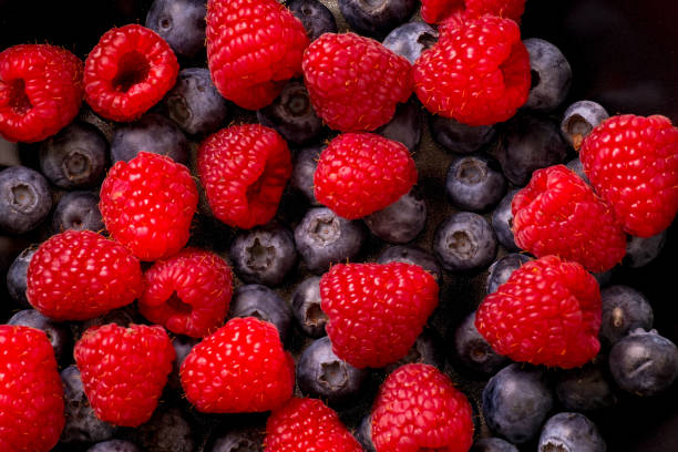 istock Close-Up Of Red And Black Berries 946391776