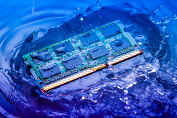 istock Close-Up Of Computer Chip In Water 946398328