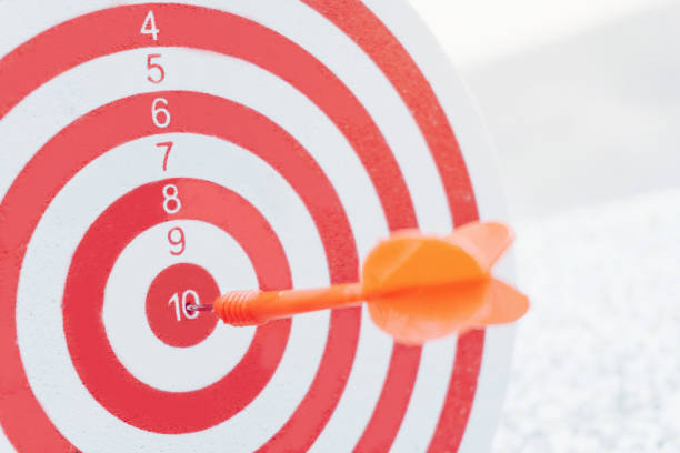 istock Arrows on archery target of dartboard Target business concept 946399432