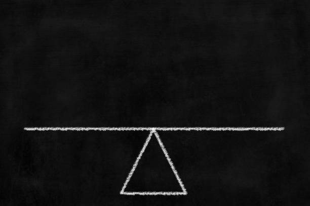 istock Balance Drawing on Chalkboard. 946402166