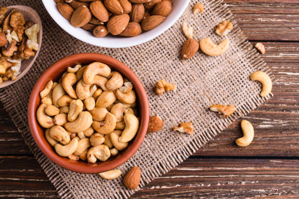 istock Variety of nuts in bowl 946451346