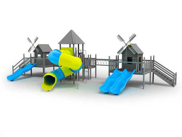 istock Modern playground for children black and white two blue slides and a yellow insert 3d rendering on a white background with a shadow 946452698