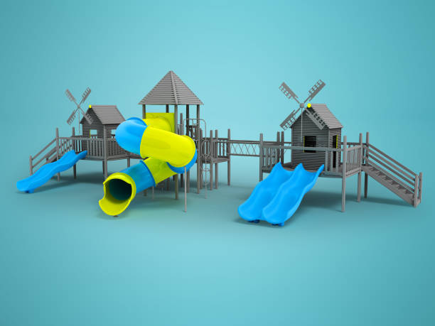 istock Modern playground for children black and white two blue slides and a yellow insert 3d rendering on a blue background with a shadow 946455038