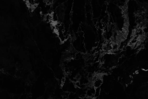 istock Abstract black marble background with natural motifs. 946455510