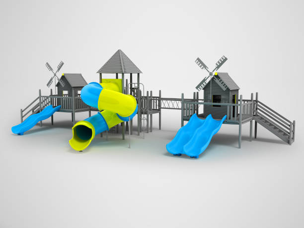 istock Modern playground for children black and white two blue slides and a yellow insert 3d rendering on a gray background with a shadow 946458492