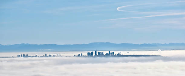 istock Vancouver skyline swallowed by fog in winter morning. 946462652