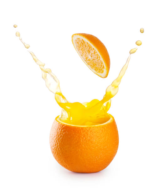 istock Splash of orange juice in orange 946466062