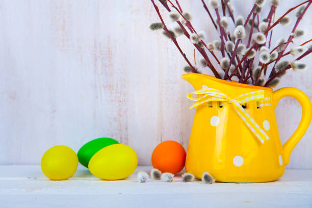 istock Easter eggs  in the nest and willow in a vase. 946466370